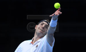 US player John Isner returns against Serbia's Novak Djokovic during their men's singles round-robin match on day two of the ATP World Tour Finals tennis tournament at the O2 Arena in London, Britain, 12  November 2018.  EPA-EFE/FACUNDO ARRIZABALAGA