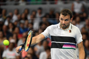 Grigor Dimitrov of Bulgaria in action against Thomas Fabbiano of Italy during day five at the Australian Open Grand Slam tennis tournament in Melbourne, Australia, 18 January 2019.  EPA-EFE/JULIAN SMITH AUSTRALIA AND NEW ZEALAND OUT