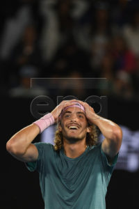 Stefanos Tsitsipas of Greece celebrates winning his men's singles fourth round match against Roger Federer of Switzerland at the Australian Open Grand Slam tennis tournament in Melbourne, Australia, 20 January 2019.  EPA-EFE/LUKAS COCH AUSTRALIA AND NEW ZEALAND OUT