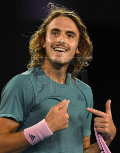 Stefanos Tsitsipas of Greece celebrates winning his men's singles fourth round match against Roger Federer of Switzerland at the Australian Open Grand Slam tennis tournament in Melbourne, Australia, 20 January 2019. EPA-EFE/LUKAS COCH AUSTRALIA AND NEW ZEALAND OUT