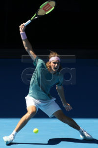 Stefanos Tsitsipas of Greece in action against Roberto Bautista Agut of Spain during the men's singles quarter final match on day nine of the Australian Open Grand Slam tennis tournament in Melbourne, Australia, 22 January 2019.  EPA-EFE/HAMISH BLAIR  AUSTRALIA AND NEW ZEALAND OUT
