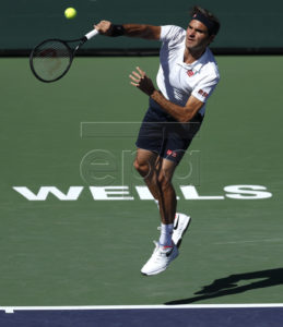 Roger Federer of Switzerland serves against Kyle Edmund of Great Britain during the BNP Paribas Open tennis tournament at the Indian Wells Tennis Garden in Indian Wells, California, USA, 13 March 2019. The men's and women's final will be played, 17 March 2019.  EPA-EFE/JOHN G. MABANGLO