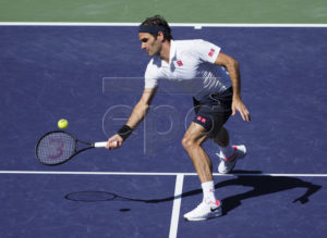 Roger Federer of Switzerland in action against Kyle Edmund of Great Britain during the BNP Paribas Open tennis tournament at the Indian Wells Tennis Garden in Indian Wells, California, USA, 13 March 2019. The men's and women's final will be played, 17 March 2019.  EPA-EFE/RAY ACEVEDO