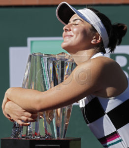 Bianca Andreescu of Canada hugs the trophy after winning against Angelique Kerber of Germany during the Finals at the BNP Paribas Open tennis tournament at the Indian Wells Tennis Garden in Indian Wells, California, USA, 17 March 2019. EPA-EFE/JOHN G MABANGLO