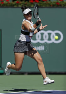 Bianca Andreescu of Canada in action against Angelique Kerber of Germany during the Finals at the BNP Paribas Open tennis tournament at the Indian Wells Tennis Garden in Indian Wells, California, USA, 17 March 2019.  EPA-EFE/JOHN G MABANGLO
