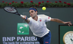 Roger Federer of Switzerland in action against Dominic Thiem of Austria during the Men's Final at the BNP Paribas Open tennis tournament at the Indian Wells Tennis Garden in Indian Wells, California, USA, 17 March 2019.  EPA-EFE/RAY ACEVEDO