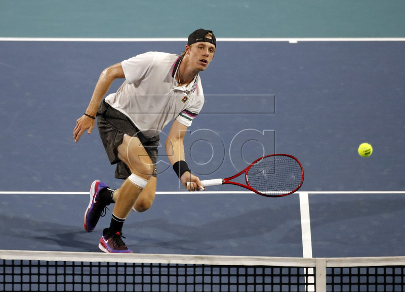 Denis Shapovalov of Canada in action against Roger Federer of Switzerland during their men's semifinals match at the Miami Open tennis tournament in Miami, Florida, USA, 29 March 2019.  EPA-EFE/JASON SZENES
