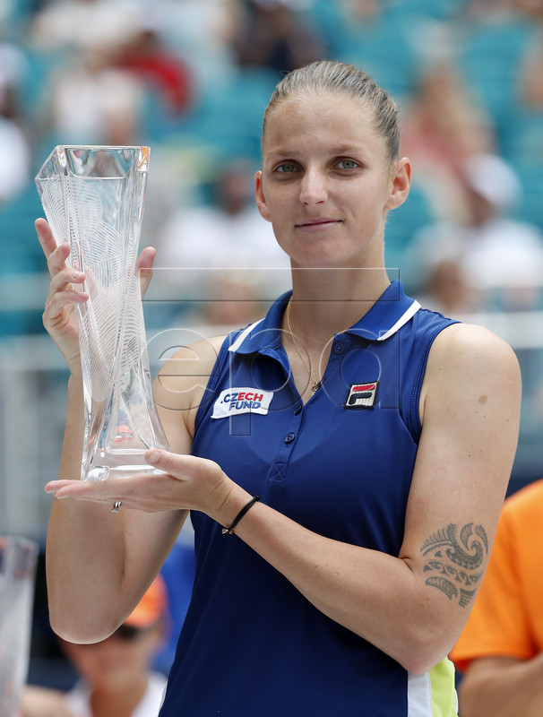 Karolina Pliskova of The Czech Republic holds her runner-up trophy after being defeated by Ashleigh Barty of Australia following their women's finals match at the Miami Open tennis tournament in Miami, Florida, USA, 30 March 2019.  EPA-EFE/RHONA WISE