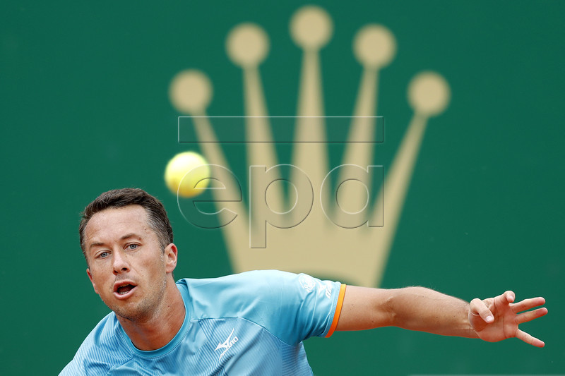 Philipp Kohlschreiber of Germany in action during his second round match against Novak Djokovic of Serbia at the Monte-Carlo Rolex Masters tournament in Roquebrune Cap Martin, France, 16 April 2019.  EPA-EFE/SEBASTIEN NOGIER