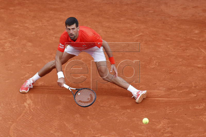 Novak Djokovic of Serbia in action during his second round match against Philipp Kohlschreiber of Germany at the Monte-Carlo Rolex Masters tournament in Roquebrune Cap Martin, France, 16 April 2019.  EPA-EFE/SEBASTIEN NOGIER