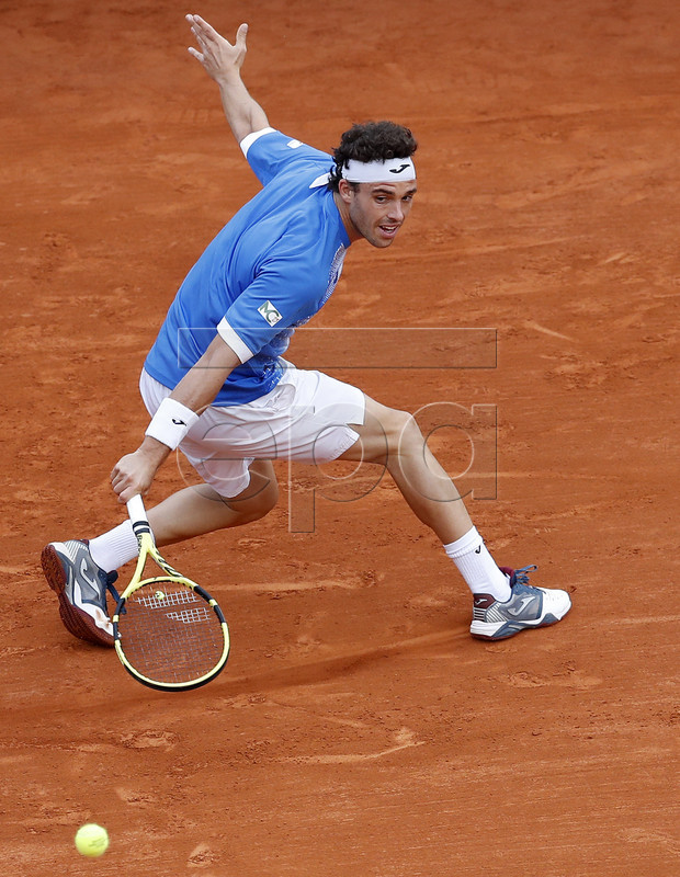 Marco Cecchinato of Italy in action during his second round match against Stan Wawrinka of Switzerland at the Monte-Carlo Rolex Masters tournament in Roquebrune Cap Martin, France, 16 April 2019.  EPA-EFE/SEBASTIEN NOGIER