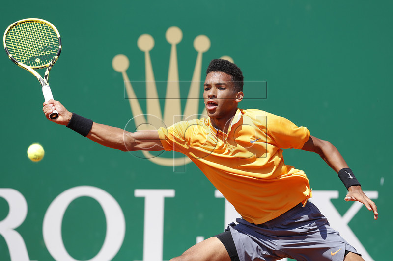 Felix Auger-Aliassime of Canada in action during his second round match against Alexander Zverev of Germany at the Monte-Carlo Rolex Masters tournament in Roquebrune Cap Martin, France, 17 April 2019. EPA-EFE/SEBASTIEN NOGIER