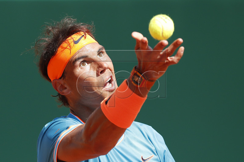 Rafael Nadal of Spain in action during his secound round match against Roberto Bautista Agut of Spain at the Monte-Carlo Rolex Masters tournament in Roquebrune Cap Martin, France, 17 April 2019.  EPA-EFE/SEBASTIEN NOGIER