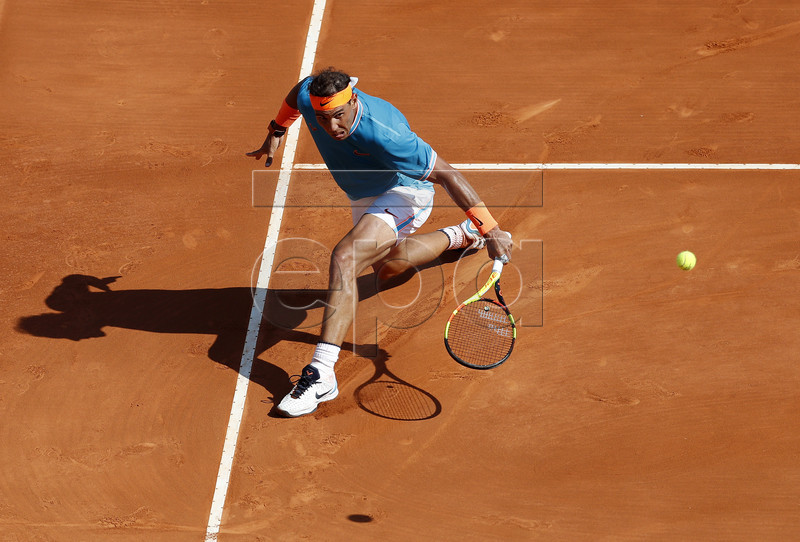 Rafael Nadal of Spain in action during his secound round match against Roberto Bautista Agut of Spain at the Monte-Carlo Rolex Masters tournament in Roquebrune Cap Martin, France, 17 April 2019.  EPA-EFE/SEBASTIEN NOGIER