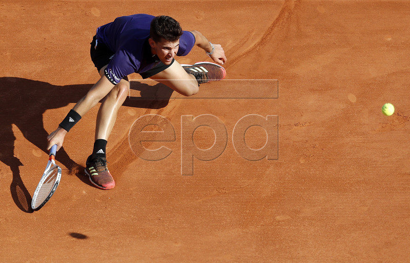 Dominic Thiem of Austria in action during his second round match against Martin Klizan of Slovakia at the Monte-Carlo Rolex Masters tournament in Roquebrune Cap Martin, France, 17 April 2019. EPA-EFE/SEBASTIEN NOGIER
