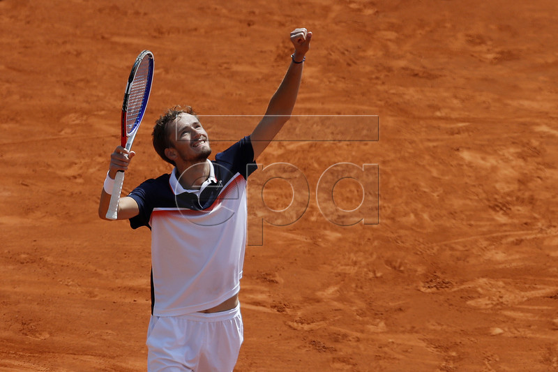 Daniil Medvedev of Russia celebrates winning against reacts Stefanos Tsitsipas of Greece during their third round match at the Monte-Carlo Rolex Masters tournament in Roquebrune Cap Martin, France, 18 April 2018.  EPA-EFE/SEBASTIEN NOGIER