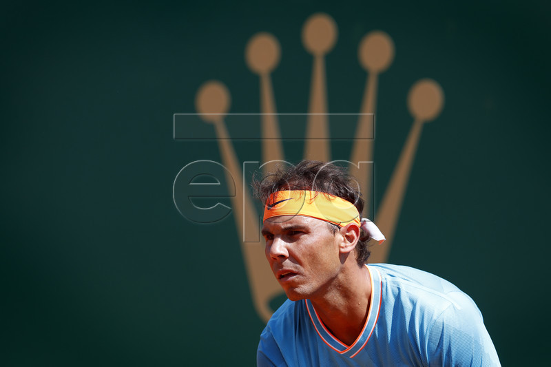 Rafael Nadal of Spain in action during his third round match against Grigor Dimitrov of Bulgaria at the Monte-Carlo Rolex Masters tournament in Roquebrune Cap Martin, France, 18 April 2018.  EPA-EFE/SEBASTIEN NOGIER
