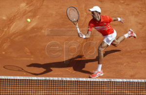 Novak Djokovic of Serbia in action during his quarterfinal match against Daniil Medvedev of Russia at the Monte-Carlo Rolex Masters tournament in Roquebrune Cap Martin, France, 19 April 2019. EPA-EFE/SEBASTIEN NOGIER