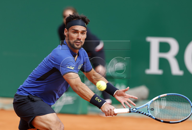 Fabio Fognini of Italy returns the ball to Rafael Nadal of Spain during their semi final match at the Monte-Carlo Rolex Masters tournament in Roquebrune Cap Martin, France, 20 April 2018.  EPA-EFE/SEBASTIEN NOGIER
