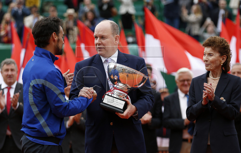 Fabio Fognini of Italy (L) poses with his trophy next to Prince Albert II of Monaco (C) and Monegasque Tennis Federation Elisabeth-Anne de Massy (R) after his final match against and Dusan Lajovic of Serbia at the Monte-Carlo Rolex Masters tournament in Roquebrune Cap Martin, France, 21 April 2019.  EPA-EFE/SEBASTIEN NOGIER