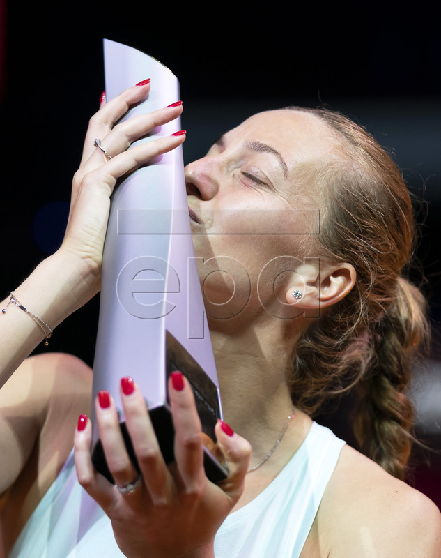 Petra Kvitova of the Czech Republic kisses her trophy after winning her final match against Anett Kontaveit of Estonia at the Porsche Tennis Grand Prix tournament in Stuttgart, Germany, 28 April 2019.  EPA-EFE/RONALD WITTEK