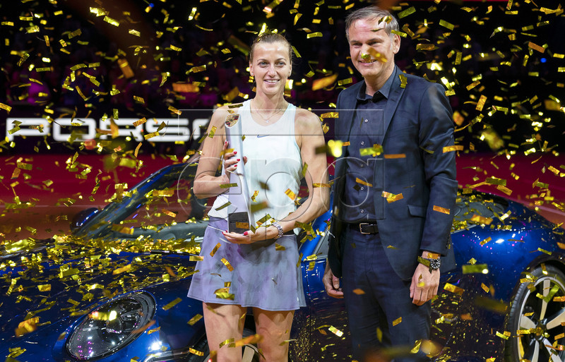 Petra Kvitova (L) of the Czech Republic poses with her trophy next to Porsche AG CEO Oliver Blume (R) after winning her final match against Anett Kontaveit of Estonia at the Porsche Tennis Grand Prix tournament in Stuttgart, Germany, 28 April 2019.  EPA-EFE/RONALD WITTEK
