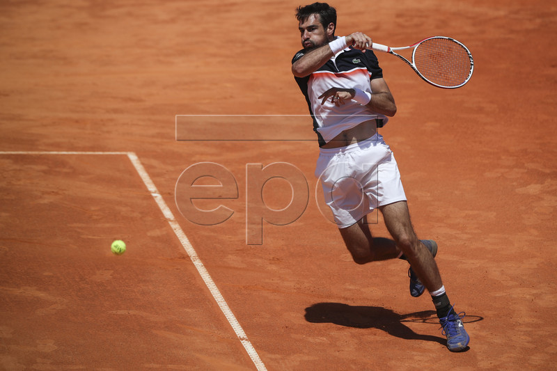 Jeremy Chardy from France in action during his first round match against Pablo Carreno-Busta from Spain at the Estoril Open Tennis tournament in Cascais, near Lisbon, Portugal, 30 April 2019.  EPA-EFE/JOSE SENA GOULAO