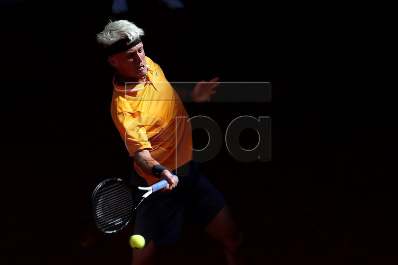 Spanish player Nicola Kuhn in action during his men's qualifying match against US player Taylor Fritz at the Mutua Madrid Open tennis tournament in Madrid, Spain, 04 May 2019. EPA-EFE/CHEMA MOYA