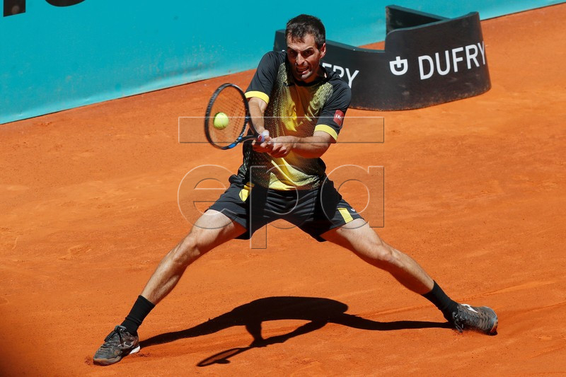 Spanish player Albert Ramos in action during his qualifying match against Japan's Taro Daniel at the Mutua Madrid Open tennis tournament in Madrid, Spain, 04 May 2019. EPA-EFE/CHEMA MOYA
