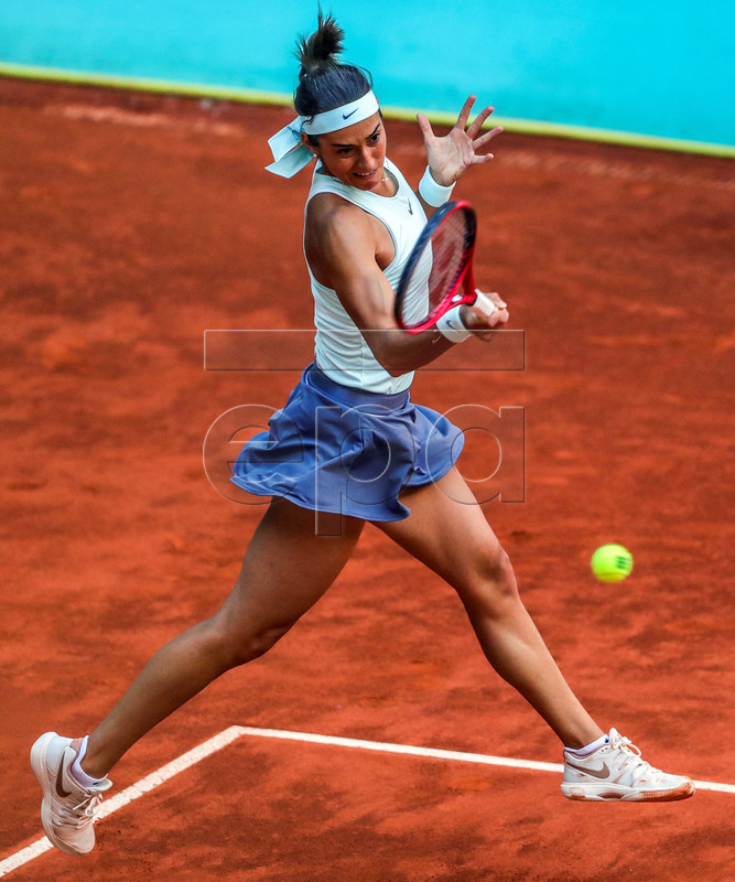 Caroline Garcia of France in action against Su-Wei Hsieh of Taiwan during their first round match of the Mutua Madrid Open 2019 tennis tournament at Caja Magica in Madrid, Spain, 04 April 2019. EPA-EFE/JUANJO MARTIN