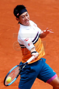 Kei Nishikori of Japan in action against Hugo Dellien of Bolivia during their second round match of the Mutua Madrid Open tennis tournament at the Caja Magica complex in Madrid, Spain, 08 May 2019.  EPA-EFE/CHEMA MOYA