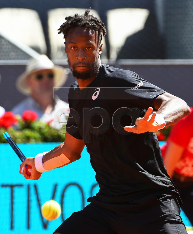 Gael Monfils of France in action against Roger Federer of Switzerland during their third round match of the Mutua Madrid Open tennis tournament at the Caja Magica complex in Madrid, Spain, 09 May 2019.  EPA-EFE/FERNANDO VILLAR
