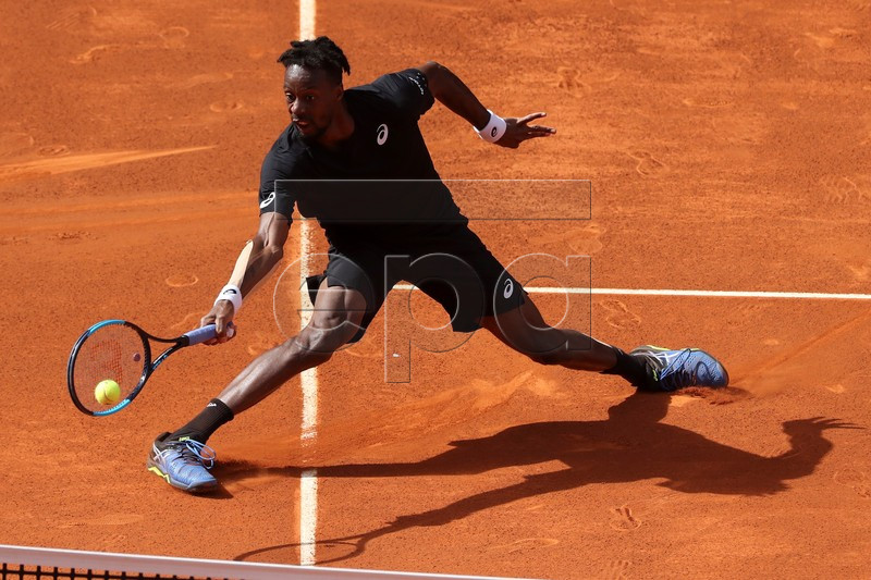 Gael Monfils of France in action against Roger Federer of Switzerland during their third round match of the Mutua Madrid Open tennis tournament at the Caja Magica complex in Madrid, Spain, 09 May 2019.  EPA-EFE/Kiko Huesca