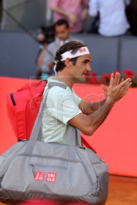 Switzerland's Roger Federer leaves the court after losing his quarter final match against Austria's Dominic Thiem at the Mutua Madrid Open tennis tournament in Madrid, Spain, 10 May 2019. EPA-EFE/KIKO HUESCA