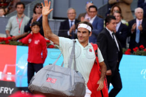Switzerland's Roger Federer leaves the court after losing his quarter final match against Austria's Dominic Thiem at the Mutua Madrid Open tennis tournament in Madrid, Spain, 10 May 2019.  EPA-EFE/KIKO HUESCA