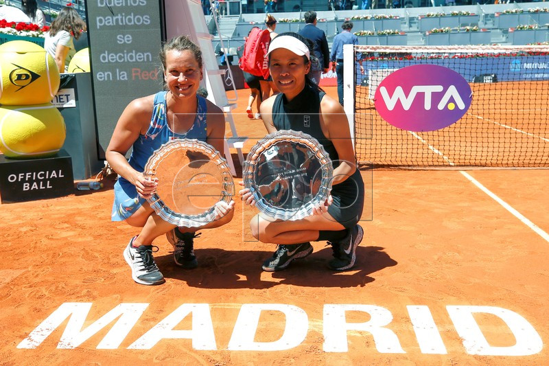 Tennis players Su-Wei Hsieh (R) from Taiwan and Barbora Strycova (L) from Czech Republic pose with their trophies after winning their women's doubles final against  Gabriela Dabrowski of Canada and Yifan Xu of China at the Mutua Madrid Open tennis tournament in Madrid, Spain, 11 May 2019.  EPA-EFE/CHEMA MOYA
