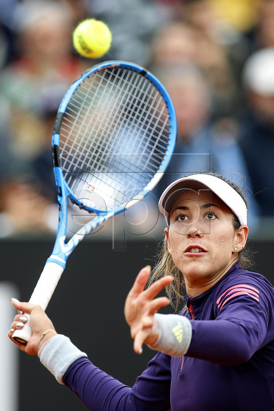 Garbine Muguruza of Spain in action against Zheng Saisai of China during their women's singles first round match at the Italian Open tennis tournament in Rome, Italy, 13 May 2019.  EPA-EFE/RICCARDO ANTIMIANI