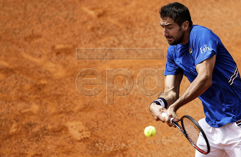 Marin Cilic of Croatia in action against Andrea Basso of Italy during their men's singles first round match at the Italian Open tennis tournament in Rome, Italy, 14 May 2019.  EPA-EFE/RICCARDO ANTIMIANI