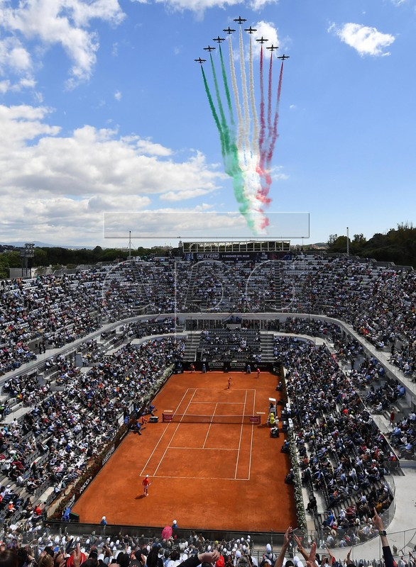 The Frecce Tricolori air squadron flies over the Foro Italico as Serbia's Novak Djokovic plays against Canada's Denis Shapovalov during their ATP Masters tournament tennis match in Rome, Italy, 16 May 2019.  EPA-EFE/ETTORE FERRARI