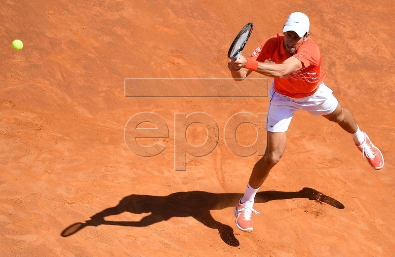 Novak Djokovic of Serbia in action during his men's singles second round match against Denis Shapovalov of Canada at the Italian Open tennis tournament in Rome, Italy, 16 May 2019.  EPA-EFE/ETTORE FERRARI