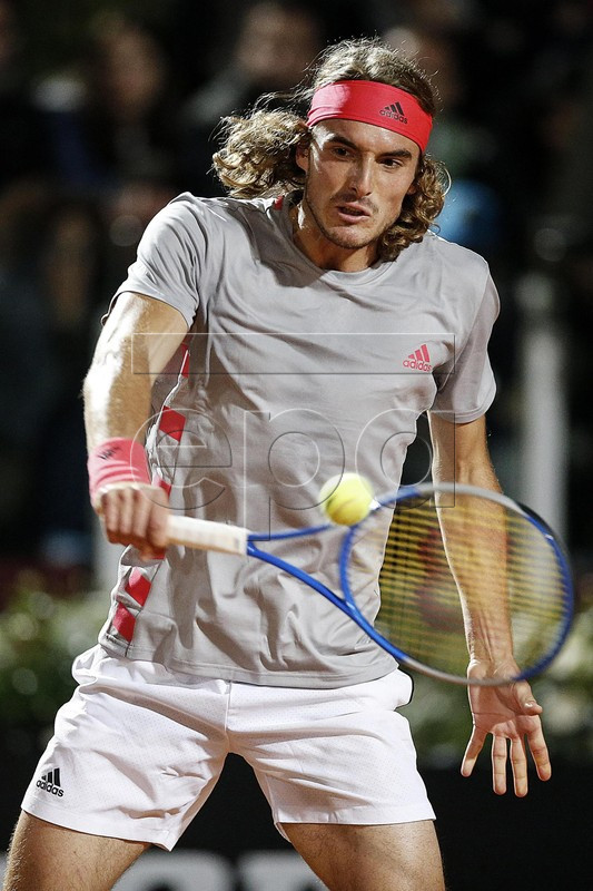 Stefanos Tsitsipas of Greece in action against Fabio Fognini of Italy during their mens singles third round match at the Italian Open tennis tournament in Rome, Italy, 16 May 2019.  EPA-EFE/RICCARDO ANTIMIANI