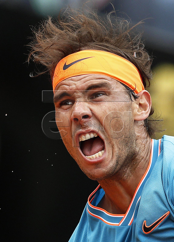 Rafael Nadal of Spain in action against Stefanos Tsitsipas of Greece during their men's singles semi final match at the Italian Open tennis tournament in Rome, Italy, 18 May 2019. EPA-EFE/RICCARDO ANTIMIANI