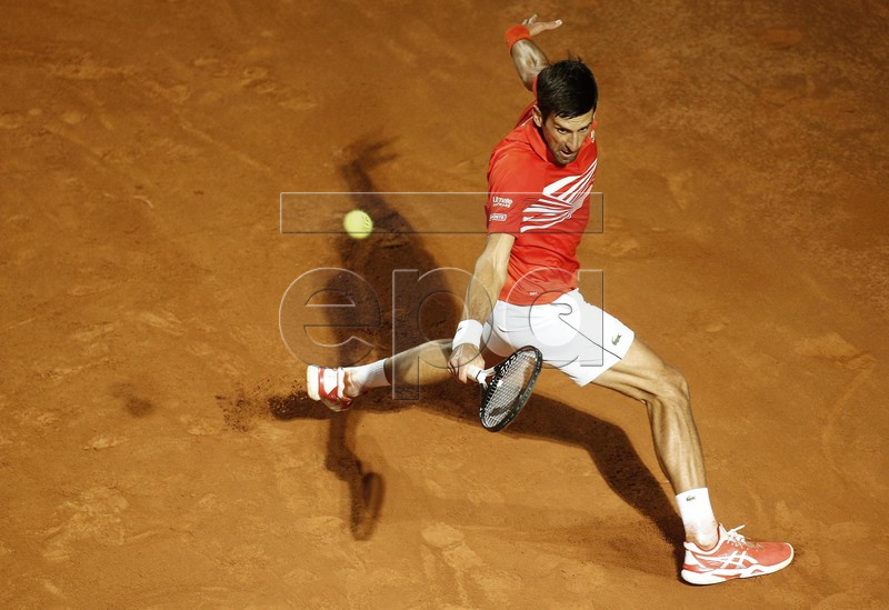 Novak Djokovic of Serbia in action against Diego Schwartzman of Argentina during their men's semifinal match at the Italian Open tennis tournament in Rome, Italy, 18 May 2019. EPA-EFE/RICCARDO ANTIMIANI