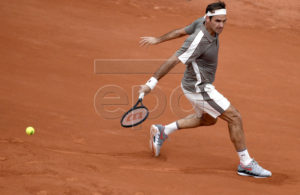 Roger Federer of Switzerland plays Lorenzo Sonego of Italy during their men?s first round match during the French Open tennis tournament at Roland Garros in Paris, France, 26 May 2019.  EPA-EFE/JULIEN DE ROSA
