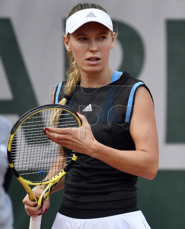 Caroline Wozniacki of Denmark plays Veronika Kudermetova of Russia during their women?s first round match during the French Open tennis tournament at Roland Garros in Paris, France, 27 May 2019.  EPA-EFE/JULIEN DE ROSA