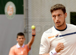 Pablo Carreno Busta of Spain plays Joao Sousa of Portugal during their men?s first round match during the French Open tennis tournament at Roland Garros in Paris, France, 27 May 2019. EPA-EFE/CAROLINE BLUMBERG