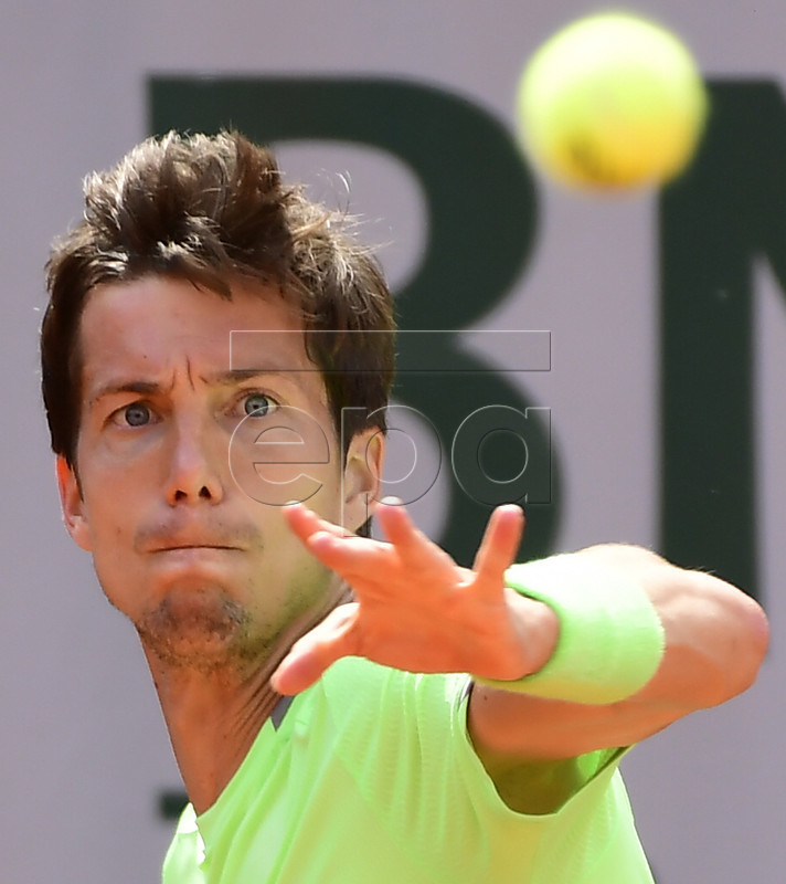 Aljaz Bedene of Britain plays Borna Coric of Croatia during their men?s first round match during the French Open tennis tournament at Roland Garros in Paris, France, 27 May 2019.  EPA-EFE/CAROLINE BLUMBERG