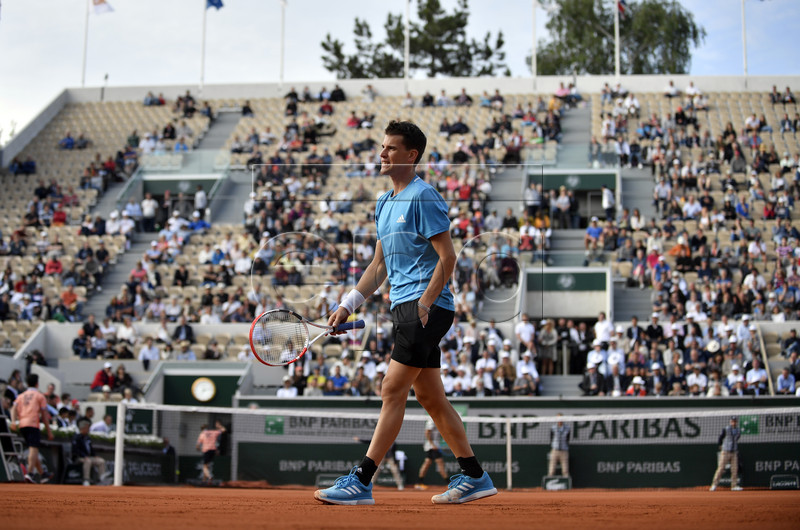 Dominic Thiem of Austria plays Tommy Paul of the USA during their men?s first round match during the French Open tennis tournament at Roland Garros in Paris, France, 27 May 2019. EPA-EFE/JULIEN DE ROSA
