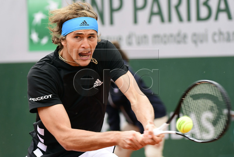 Alexander Zverev of Germany plays John Millman of Australia during their men?s first round match during the French Open tennis tournament at Roland Garros in Paris, France, 28 May 2019. EPA-EFE/CAROLINE BLUMBERG
