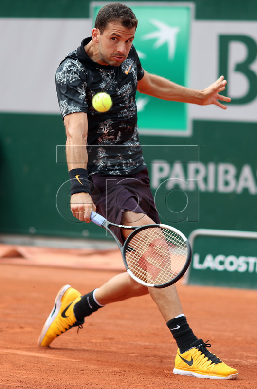 Grigor Dimitrov of Bulgaria plays Marin Cilic of Croatia during their men?s second round match during the French Open tennis tournament at Roland Garros in Paris, France, 29 May 2019.  EPA-EFE/SRDJAN SUKI